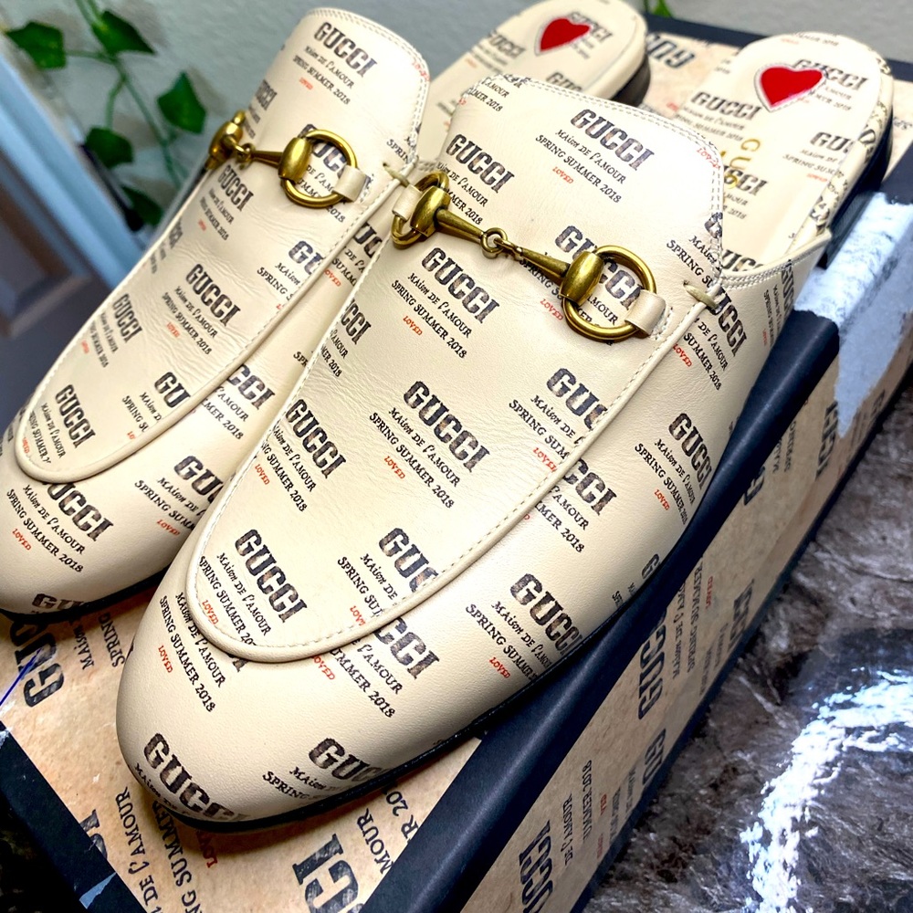 Gucci mules with iconic logo